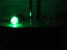 REM POD dark w green light