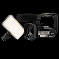 Video camera with microphone and light on a white background