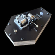 Mechanical device with Para4ce branding on a black background