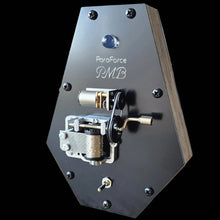Coffin shaped music box on a black background