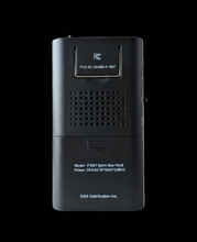 Black electronic device with text and FCC ID on a black background