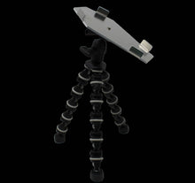 PMB mount with flexible tripod on a black background